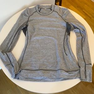 Lululemon Long Sleeve Top with hidden pocket, thumbholes and mesh detail